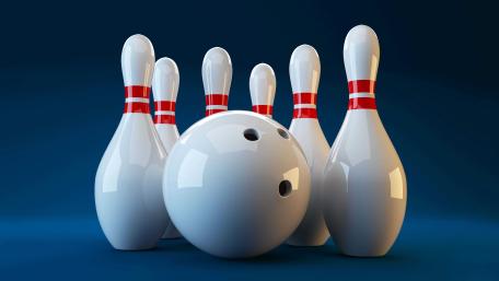 Bowling Action on a Blue Background wallpaper