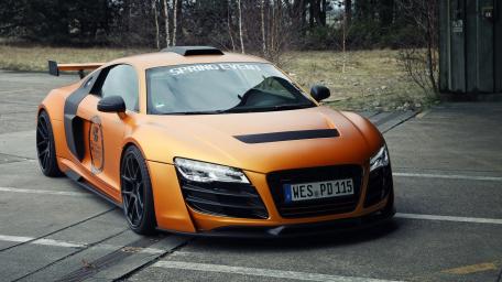 Sleek Audi R8 in Bold Orange Finish wallpaper
