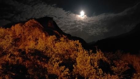 Moonlit Tranquility Over Rugged Horizons wallpaper
