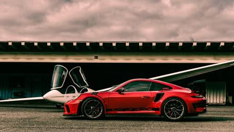 Porsche 911 GT3 RS in Striking Red 4K wallpaper
