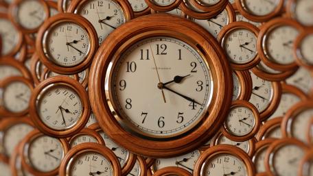 Timeless Harmony of Clocks in Motion wallpaper