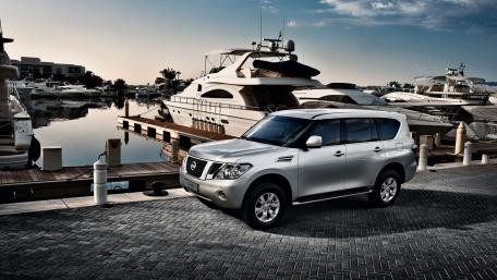 Nissan Patrol: Elegance Meets Adventure by the Marina wallpaper