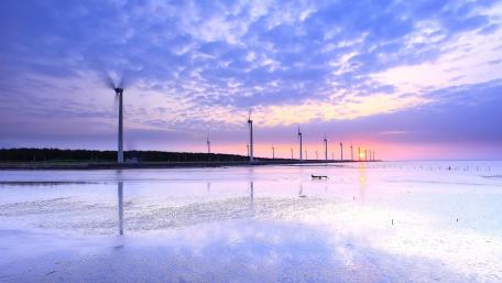 Wind Turbines at Sunrise by the Sea wallpaper