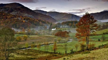Autumn Serenity in a Misty Valley wallpaper