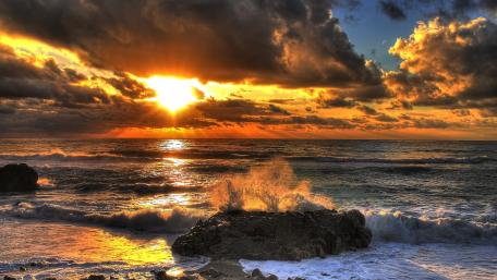 Sunset Waves Splattering on Coastline wallpaper