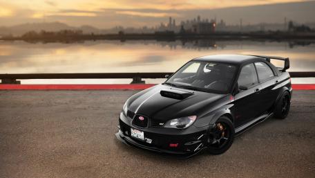 Subaru Impreza at Sunset by the Shore wallpaper