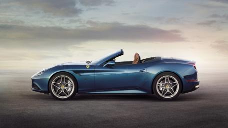 Sleek Ferrari California Against Serene Sky wallpaper