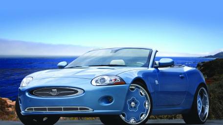 Blue Convertible by the Coastline wallpaper