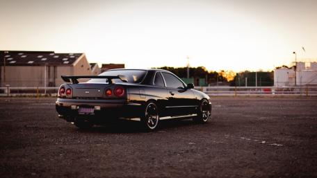 Nissan Skyline GT-R in Serene Sunset Setting wallpaper