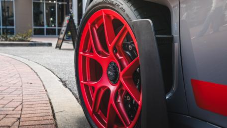 Vibrant Red Wheels of a Sports Car wallpaper