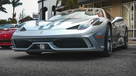 Sleek Ferrari Beauty in Urban Setting wallpaper