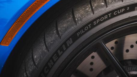 Dynamic Close-up of a Performance Tire Surface wallpaper