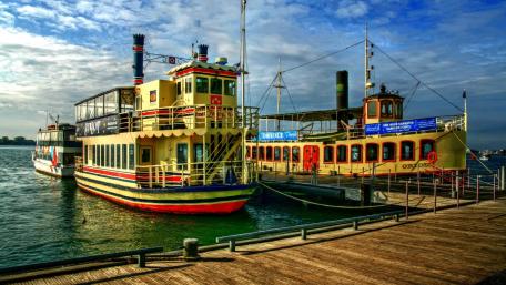 Vibrant Harbor View with Classic Ships wallpaper
