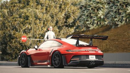 Sleek Porsche 911 GT3 RS on Scenic Drive wallpaper