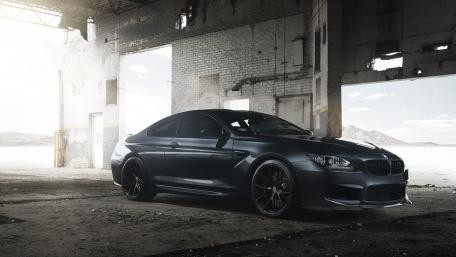 BMW Elegance in an Industrial Setting wallpaper