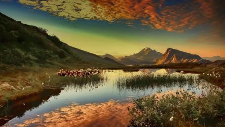 Sunset Splendor Over Serene Mountain Lake wallpaper