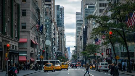 Vibrant NYC Cityscape with Taxis and Skyscrapers wallpaper