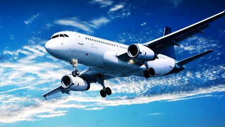 Majestic Airliner Soaring Through the Sky wallpaper