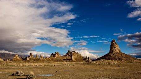 Majestic Desert Buttes Under Expansive Sky wallpaper