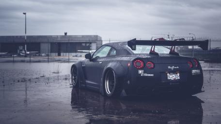 Nissan GT-R Liberty Walk in Moody Industrial Setting wallpaper