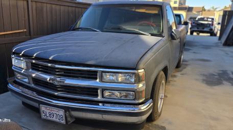 Classic Chevy Pickup in Sunlit Driveway wallpaper