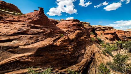 Rock Formations Under Clear Blue Skies wallpaper