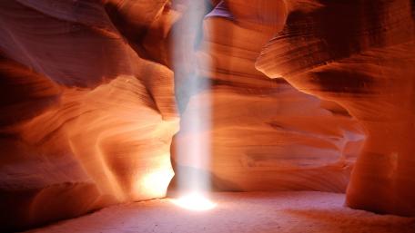 Mystical Rays in Antelope Canyon Light Up the Stones wallpaper