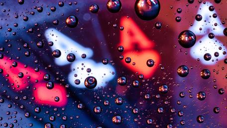 Raindrop Symphony in Vivid Hues wallpaper