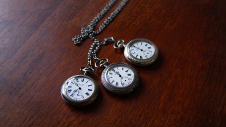 Timeless Elegance in a Trio of Pocket Watches wallpaper