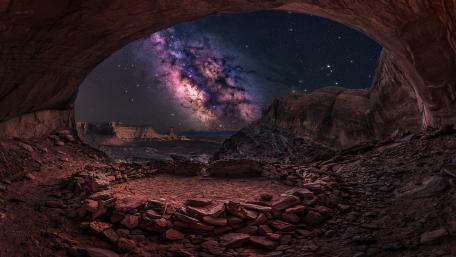Majestic Cave Under the Milky Way Night Sky wallpaper