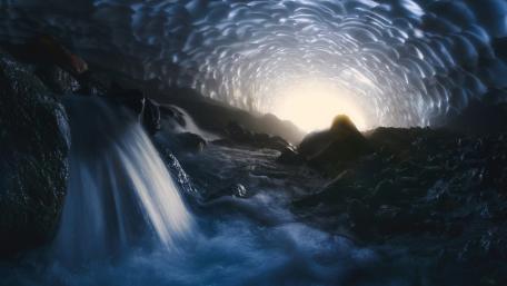 Mystical Ice Cave Waterfall Experience wallpaper