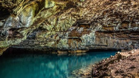 Mystical Cave Reflections in Nature's Depths wallpaper