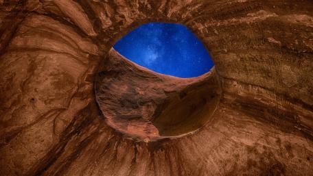 Stunning Cave View Under Starry Sky wallpaper