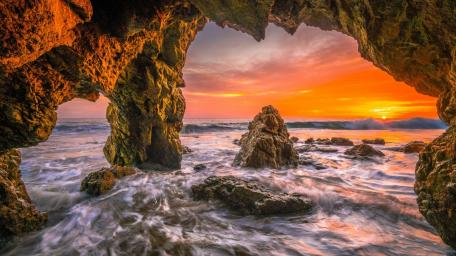 Mystical Sea Cave at Sunset wallpaper
