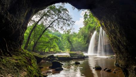 Serene Cave View of Waterfall in Nature wallpaper