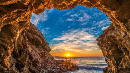 Breathtaking Sunset Over El Matador Sea Cave Viewpoint wallpaper