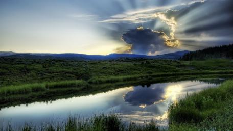 Serene Sunrise Over Tranquil Waters wallpaper