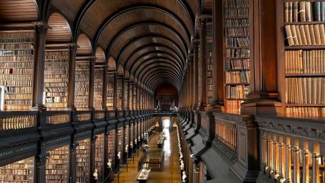 Grand Library Architecture with Endless Bookshelves wallpaper