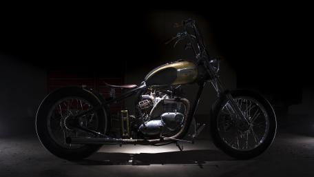 Triumph Bonneville Bobber in Shadowed Elegance wallpaper