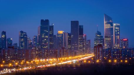 Twilight Skyscrapers in a Futuristic Cityscape wallpaper