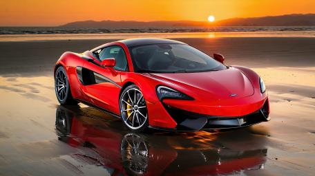 Red Supercar Against a Fiery Sunset wallpaper