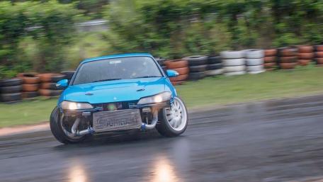 A blue Nissan Silvia S15 drifting wallpaper