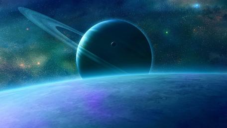 Ringed Planet Over Blue Horizon wallpaper