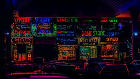 Neon Game Store at Night Cityscape wallpaper