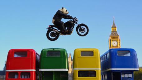 Panda Bears Jumping Buses wallpaper