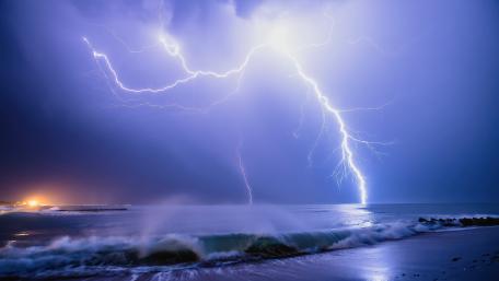 Stormy Evening by the Sea with Lightning wallpaper