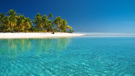 Tropical Paradise Escape on Azure Waters wallpaper