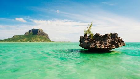 Mauritian Islet Surrounded by Crystal Waters wallpaper