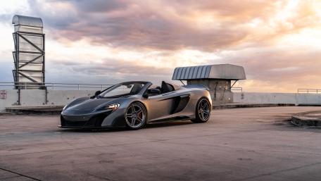 McLaren MP4-21 Against a Stunning Sunset Sky wallpaper