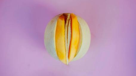 Melon Medley: A Playful Perspective on Fruit Art wallpaper